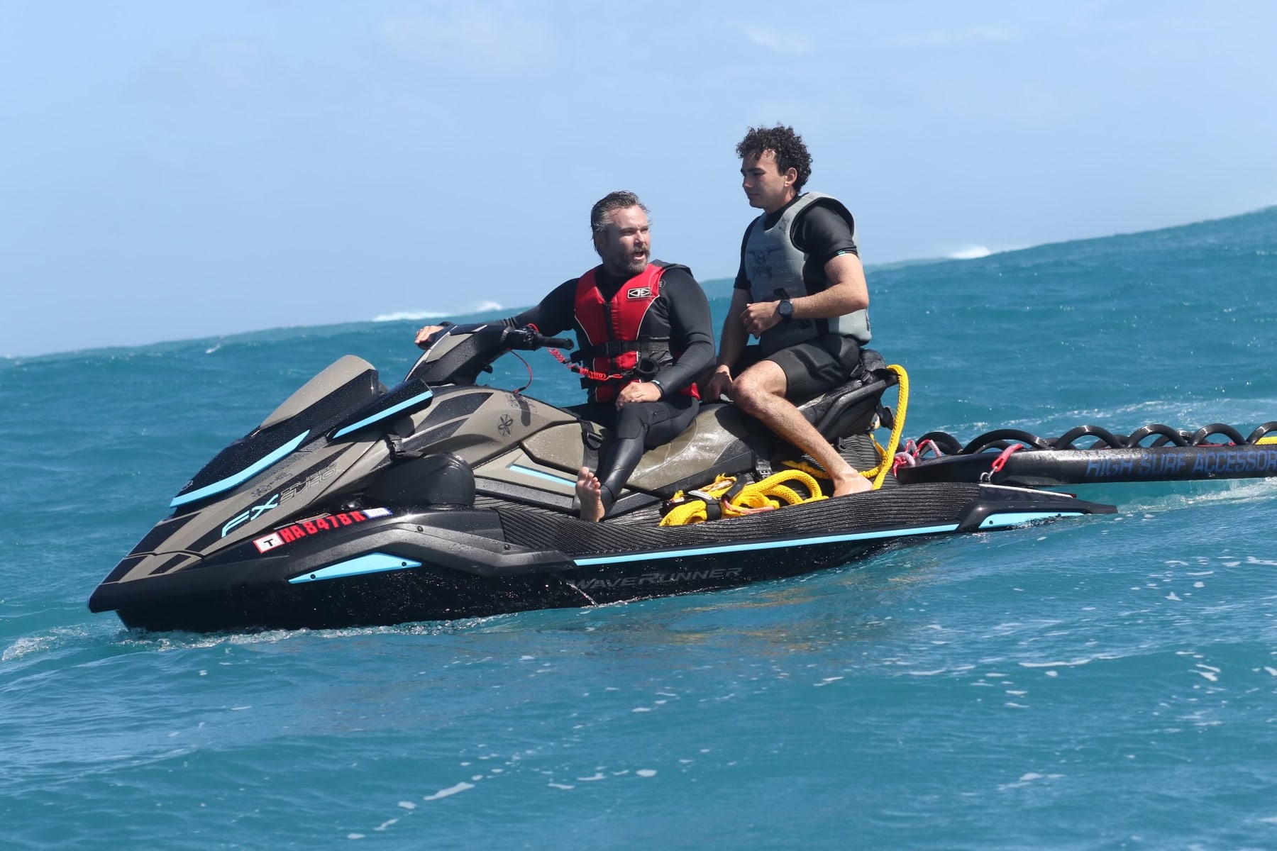Stephen Leakos on a jet ski during tow-in surf training